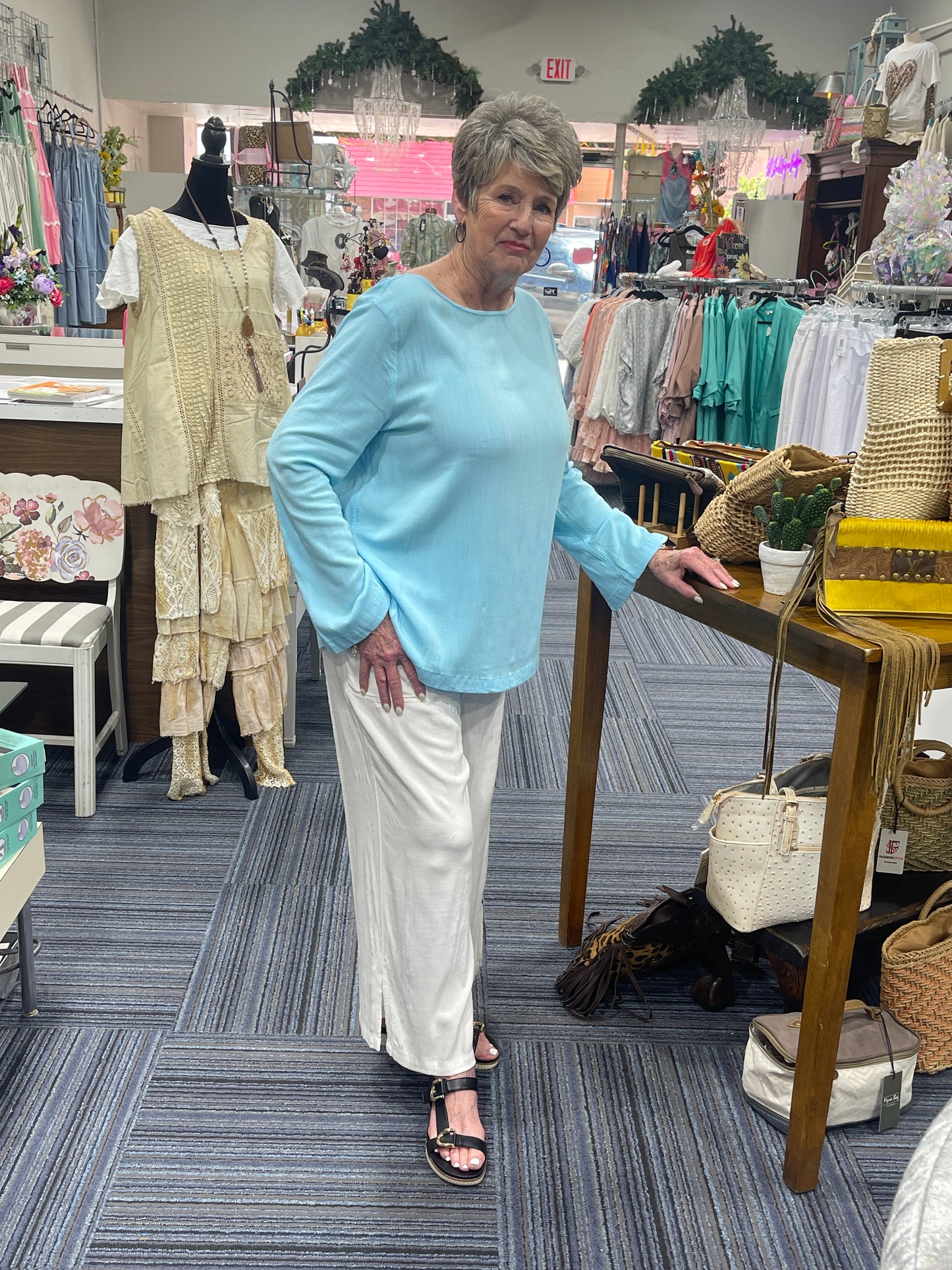White modal, rayon, and spandex blend, wide leg pants, super comfortable, elastic waist band, front pockets, side slits bottom of legs. Oversized can size down