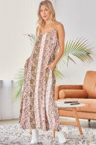 
We love this unique print all over the maxi dress with v neckline. Non sheer, lined.
100% RAYON